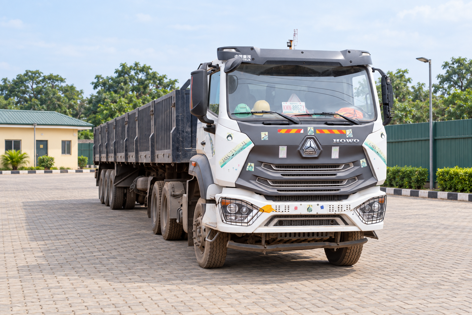 Close view of a Royal Gate HOWO haulage truck in an enhanced yard setting